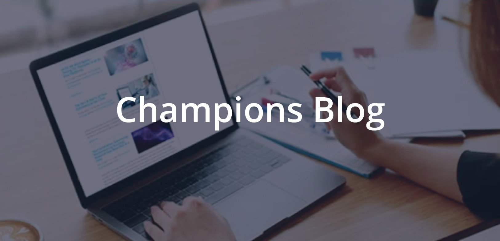 Researcher reading the Trends in Oncology Blog from Champions