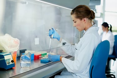Female researcher working on preclinical testing