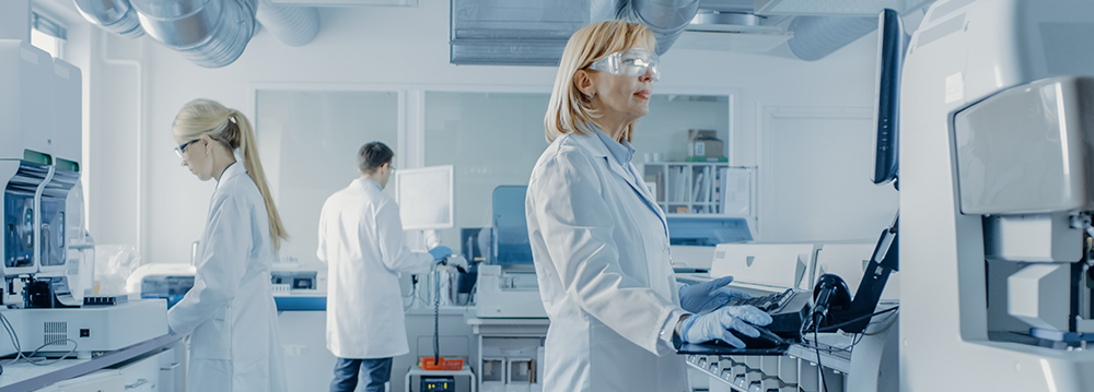 A group of researchers working on clinical trials solutions A group of researchers working on clinical trials solutions